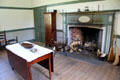 Parlor in brick house at Ulster American Folk Park. Omagh, Northern Ireland.