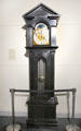 Long case clock by Spaulding & Co. of Chicago made of Irish bog oak at Ulster American Folk Park. Omagh, Northern Ireland.
