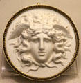 Gorgon Medusa stoneware medallion by Wedgwood & Bentley of Etruria at British Museum. London, United Kingdom.