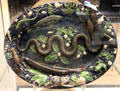 Earthenware dish with snake, eel, fish, flora & fauna by workshop of Bernard Palissy of Paris at British Museum. London, United Kingdom.