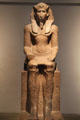 Red granite seated statue of Sobekemsaf I from Karnak at British Museum. London, United Kingdom.