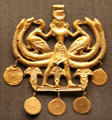 Sheet gold pendant of Cretan nature god wearing Minoan kilt at British Museum. London, United Kingdom.
