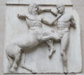 Centaur wrestles Lapith marble metope section of Athens Parthenon Frieze by Pheidias at British Museum. London, United Kingdom