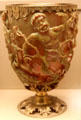 Roman carved glass cup in metal mounts depicts story of King Lycurgus at British Museum. London, United Kingdom.
