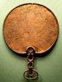 Celtic culture bronze mirror with engraved back found at Desborough, Northhamptonshire at British Museum. London, United Kingdom.