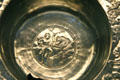Detail of Roman flanged silver bowl showing with man spearing bear part of Mildenhall Treasure at British Museum. London, United Kingdom.