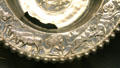 Detail of Roman flanged silver bowl showing women in profile between sheep & spotted cats part of Mildenhall Treasure at British Museum. London, United Kingdom.