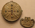 Anglo-Saxon harness fitting from Hardingtone & bird shaped brooch from Suffolk at British Museum. London, United Kingdom.