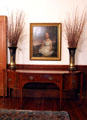 Sideboard under portrait at Bragg-Mitchell Mansion. Mobile, AL.