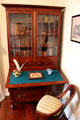 Desk with fold-open writing surface & bookcase at Conde-Charlotte Museum. Mobile, AL.