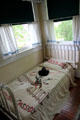 Bill Clinton boyhood bedroom with Hopalong Cassidy bedspread at Clinton Birthplace Home. Hope, AR.
