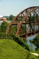 Arched span of Choctaw Route rail bridge over Arkansas River beside Clinton Presidential Library. Little Rock, AR.