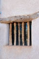 La Casa Cordova window frame with wooden bars at Tucson Museum of Art. Tucson, AZ.
