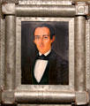 Portrait of man in tin frame from Mexico at Tucson Museum of Art. Tucson, AZ.