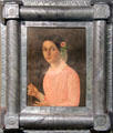 Portrait of woman in tin frame from Mexico at Tucson Museum of Art. Tucson, AZ.