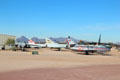 Historical jet fighters seen against mountains around Tucson at Pima Air & Space Museum. Tucson, AZ.