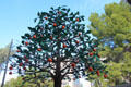 Tucson Link streetcar shelter sculpted art in form of fruit tree. Tucson, AZ.