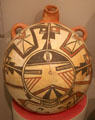 Hopi native polychrome ceramic canteen with katsina face at Arizona State Museum. Tucson, AZ.