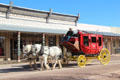Horse-drawn stage coach on Allen Street. Tombstone, AZ.