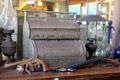 Imperial cash register & pistols on bar at Bird Cage Theatre. Tombstone, AZ.