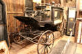 Black Moriah original Boothill hearse trimmed with pure gold & silver at Bird Cage Theatre. Tombstone, AZ.