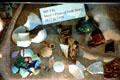 Shards from archeological dig on display under glass floor at Gold Rush History Center. Sacramento, CA.