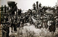 Photograph of meeting of last sections of transcontinental railway builders "The Last Spike" at Promontory, Utah on May 10, 1869 photograph by A.J. Russell at California State Railroad Museum. Sacramento, CA.