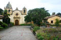 San Carlos Borromeo de Carmelo Mission with gardens & out buildings. Carmel, CA