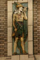 Terra-cotta panel of medieval flute player on Palace Theater. Los Angeles, CA.