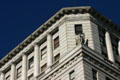 Gargoyle perches on Italianate building. Los Angeles, CA.