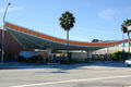 Gas Station with formed triangular roof at corner S. Santa Monica Blvd. & Crescent Dr. Beverly Hills, CA.