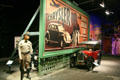 Billboard with highway patrolman hiding behind it at Petersen Automotive Museum. Los Angeles, CA.