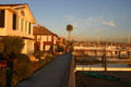 Waterfront walkway & houses on Balboa Island. CA.