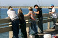 Fishing from the pier in Ocean Beach. San Diego, CA.
