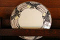 Arts & crafts ceramic plate ringed with flying birds at Marston House Museum. San Diego, CA.