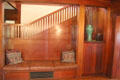 Arts & crafts stairway hall with built-in seating & telephone stand at Marston House Museum. San Diego, CA.