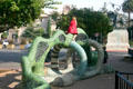 Children play on sculpture outside Mingei Museum. San Diego, CA.