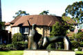 Old Globe Theater & sculpture Reclining Figure - Arch Leg by Henry Moore at San Diego Museum of Art. San Diego, CA.