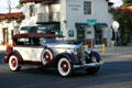 Antique Rolls crosses Paseo Delicias & La Granada. Rancho Santa Fe, CA.