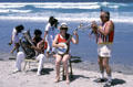Dixieland trio plays at sand sculpting contest on Coronado Island beach. San Diego, CA
