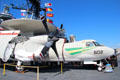 Grumman E-2 Hawkeye prop airborne radar platform at Midway aircraft carrier museum. San Diego, CA.