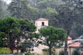 Italian-style building among pines at Getty Museum Villa. Malibu, CA.
