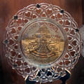 Pressed glass plate from Worlds Fair St. Louis by Westmoreland at Historical Glass Museum. Redlands, CA.
