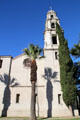 Bell tower over palms & cypress at First Congregational Church. Riverside, CA.