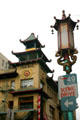 Chinese lamp & pagoda-style roof in Chinatown. San Francisco, CA.