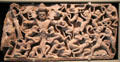 Angkor sandstone carving of scene from Ramayana; Kumbhakarna battles monkeys from Cambodia or Northeastern Thailand at Asian Art Museum. San Francisco, CA.
