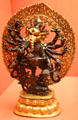 Gilded bronze dancing Ganesha from Tibet at Asian Art Museum. San Francisco, CA.