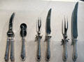 Silverware with chicken shears, knife sharpener & carving sets at de Young Museum. San Francisco, CA.