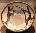 Mimbres native pottery bowl with composite figures from southern New Mexico at de Young Museum. San Francisco, CA.