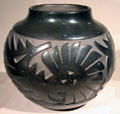 Santa Clara Pueblo earthenware black-on-black storage jar by Camilio Tafoya of New Mexico at de Young Museum. San Francisco, CA.